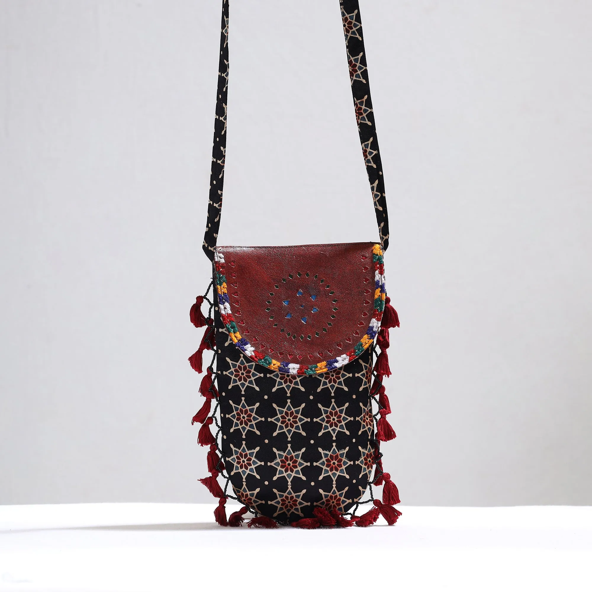 Black - Kutch Leather & Mashru Silk Sling Bag with Tassels 24